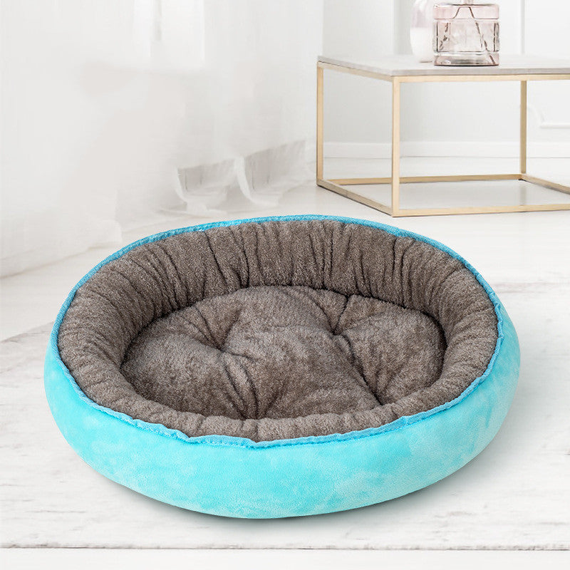 Oval Dog Bed with Bolster Rim in Turquoise