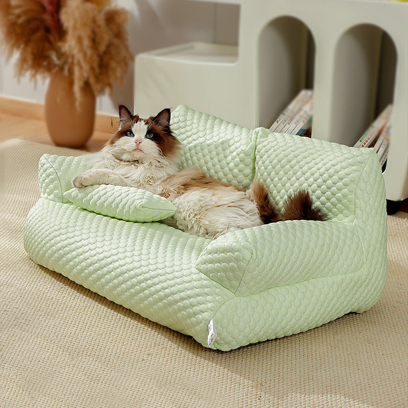 Quilted Pet Sofa with Armrests in use