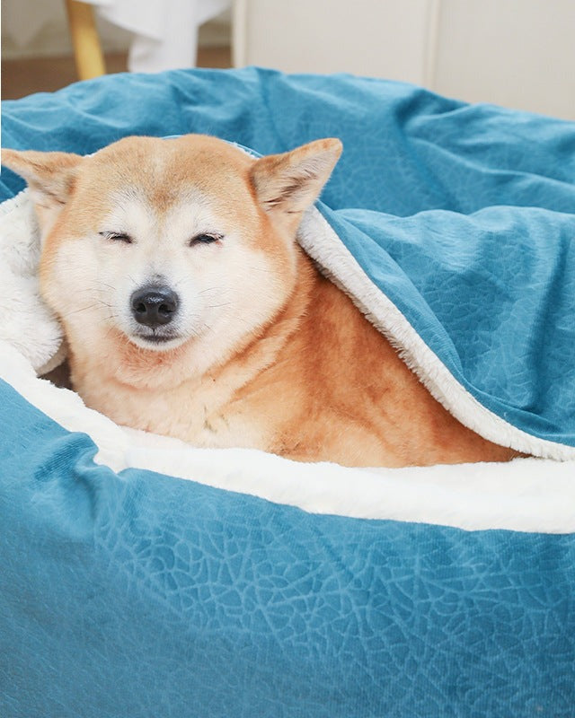 Round Hooded Burrow Dog Bed in use