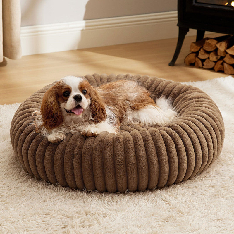 Ribbed Plush Donut Dog Bed in use