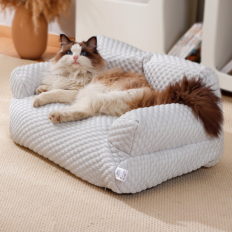 Quilted Pet Sofa with Armrests in use